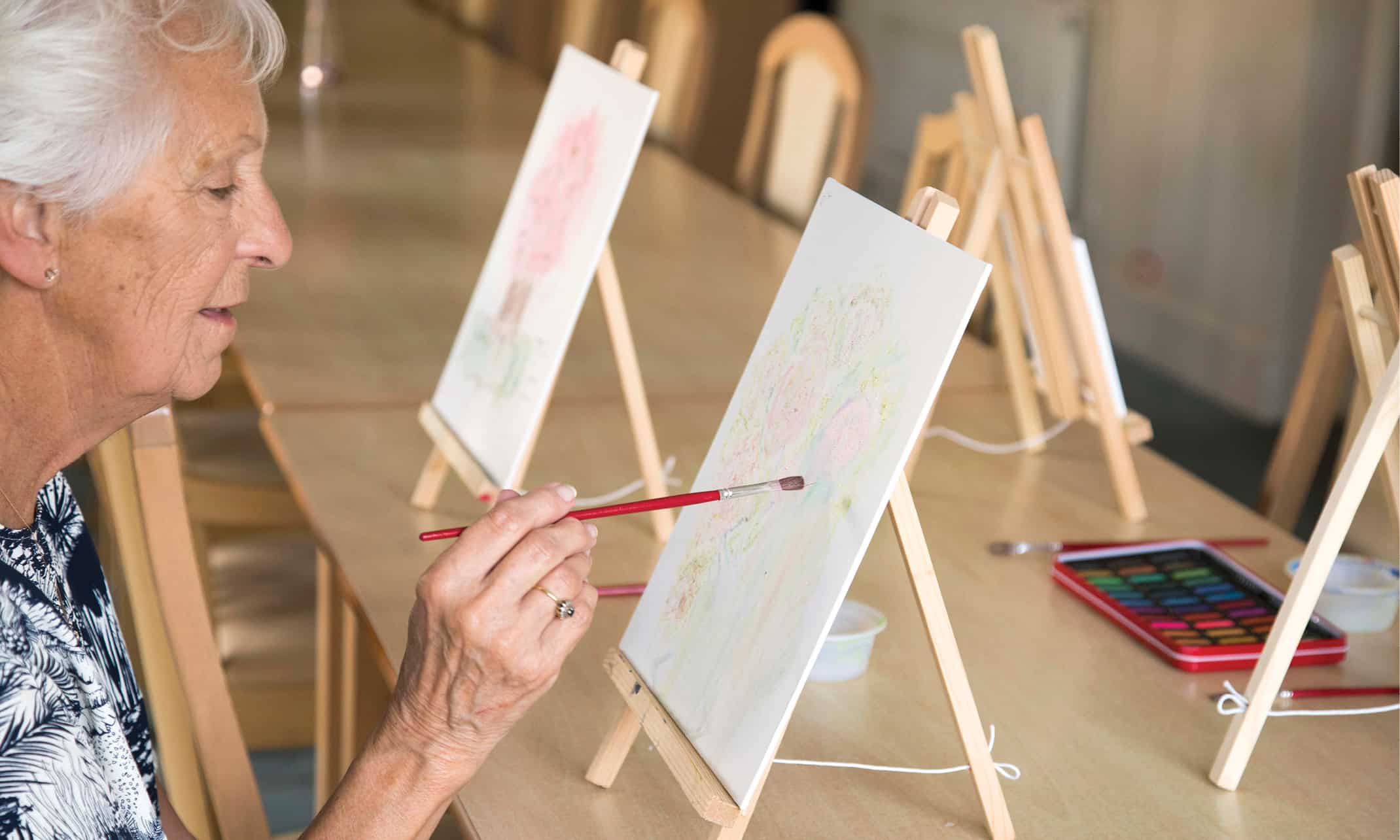 Wellbeing - Lady painting at St Vincent's